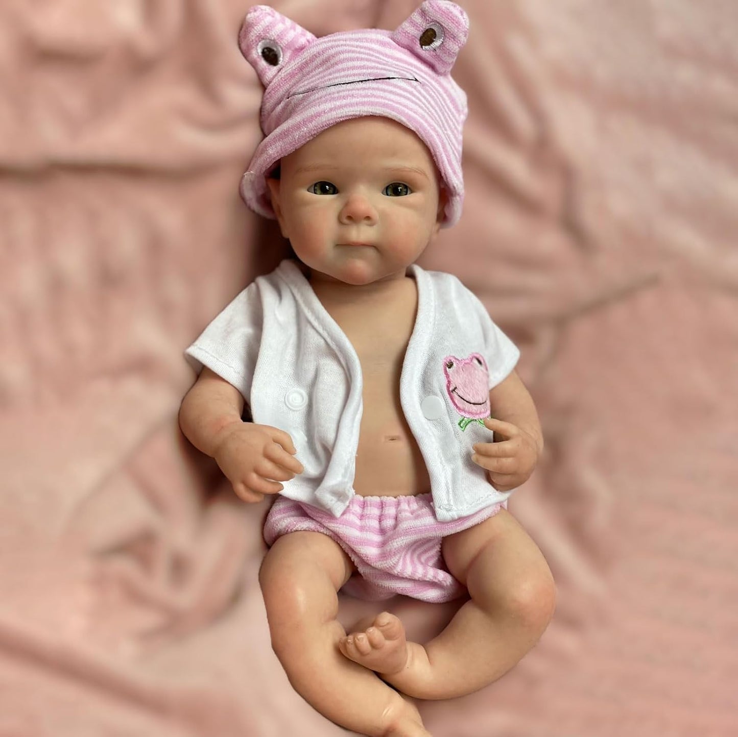 Bébé reborn Bettie en silicone de 30 cm fille vêtue de vêtements roses