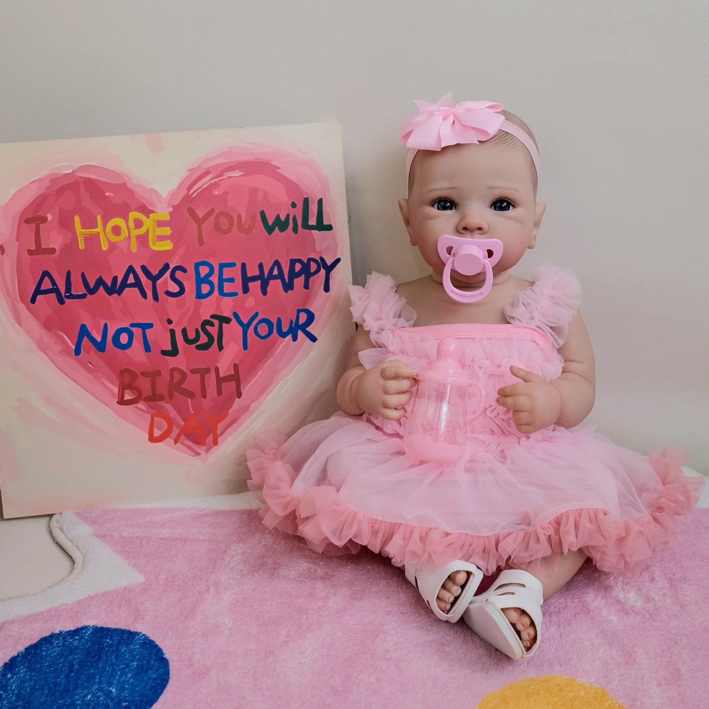 Poupée reborn Bettie de 45 cm (18 pouces) yeux ouverts en robe rose