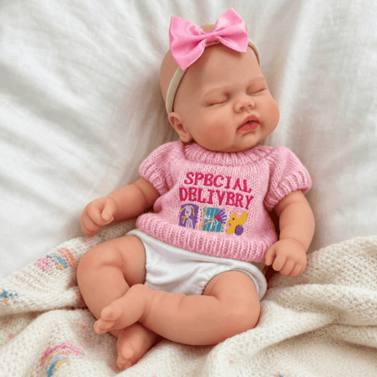 30cm Lifelike Silicone Asleep Pickle Reborn Doll Girl In Pink Sweater