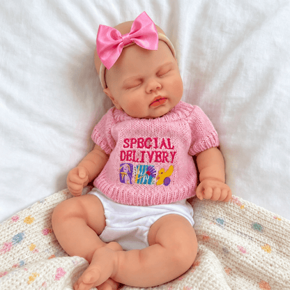 30cm Lifelike Silicone Asleep Pickle Reborn Doll Girl In Pink Sweater