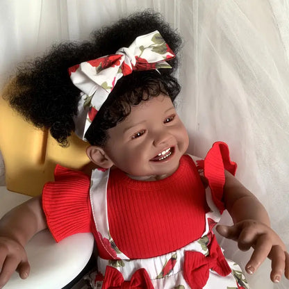 Poupée Reborn afro-américaine Mila de 60 cm corps souple et souriant