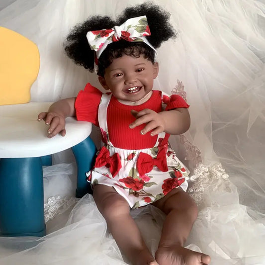 Poupée Reborn afro-américaine Mila de 60 cm corps souple et souriant