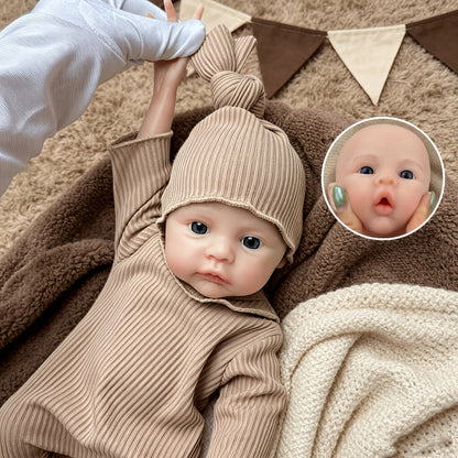 Bébé reborn fille de 30 cm en silicone vêtue d'une combinaison marron