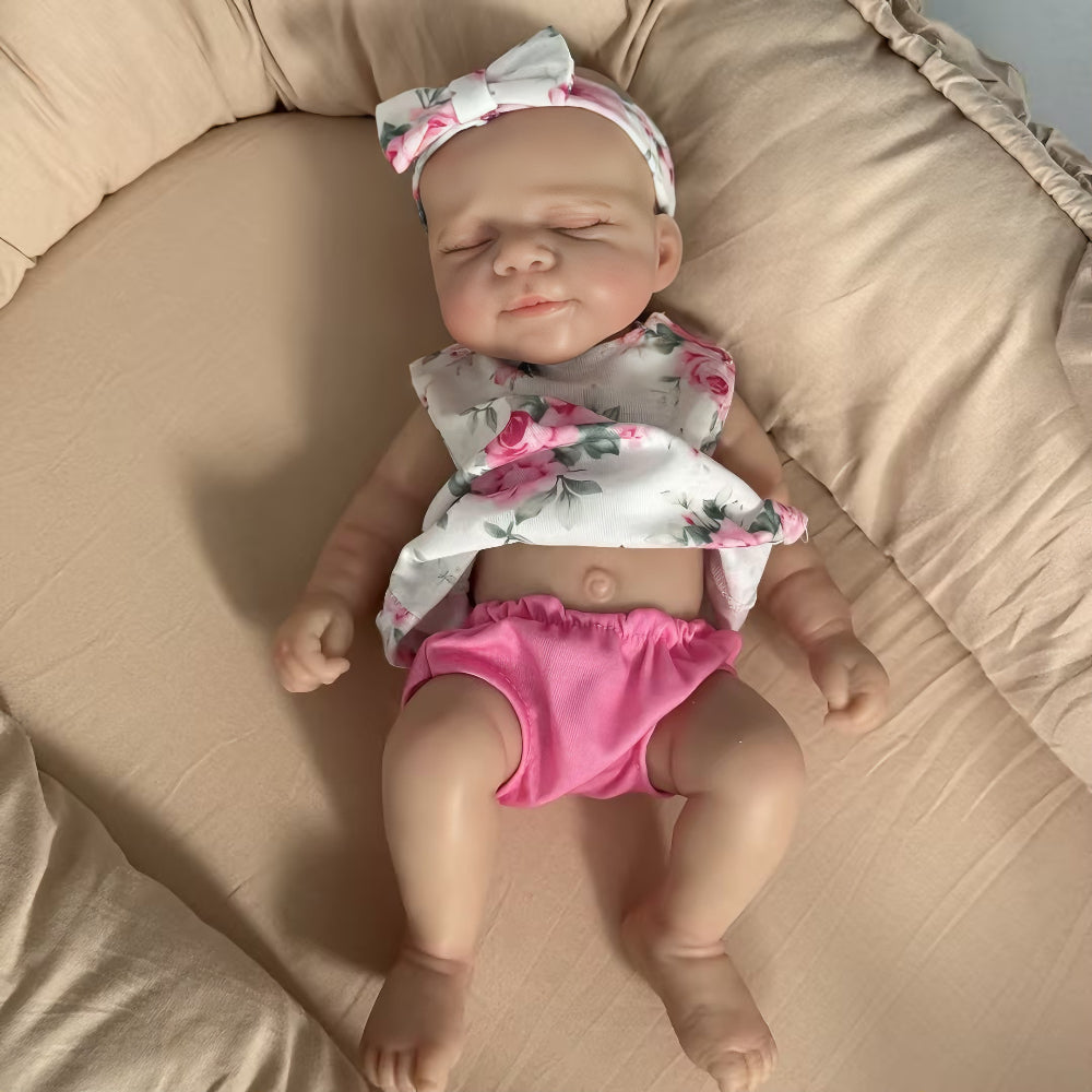 Poupée reborn Pascale de 30 cm adorable entièrement en silicone vêtue d'une tenue florale rose