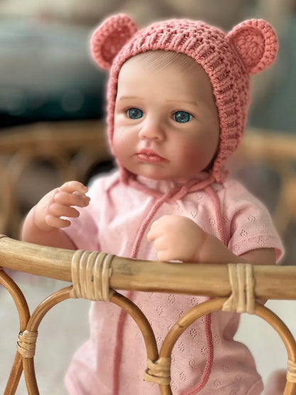 Bébé reborn Loulou de 20 pouces aux yeux bleus et au chapeau rose