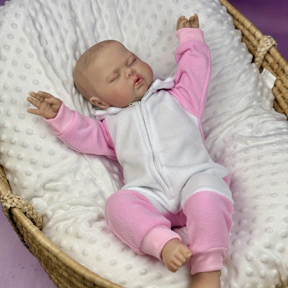 Poupée reborn de 50 cm corps en tissu doux en forme de cornichon endormi vêtue d'une tenue rose