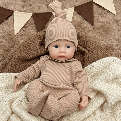 Bébé reborn fille de 30 cm en silicone vêtue d'une combinaison marron
