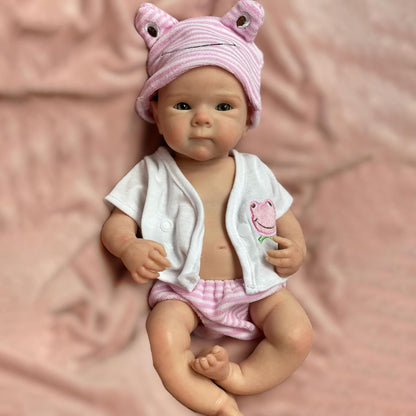 Bébé reborn Bettie en silicone de 30 cm fille vêtue de vêtements roses