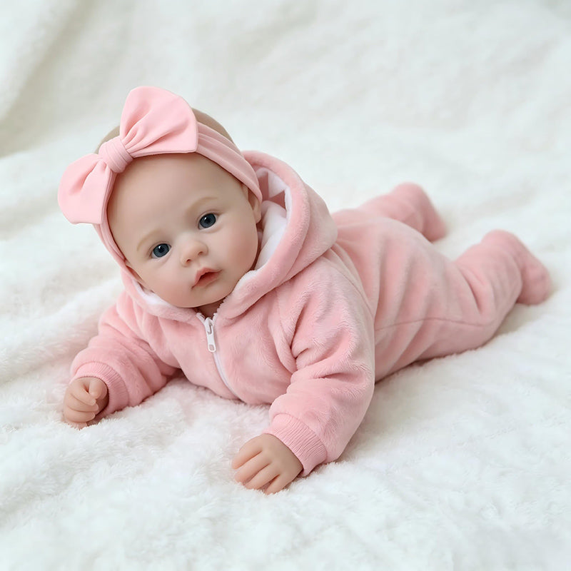 Bébé reborn fille de 45cm aux yeux bleus vêtue de tenues roses en peluche - Prairie