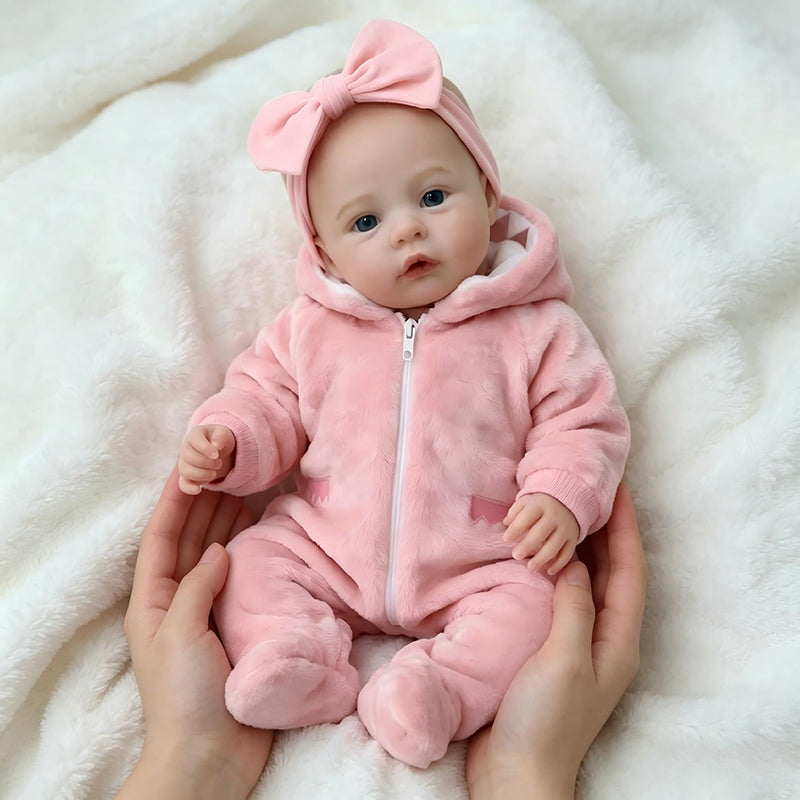 Bébé reborn fille de 45cm aux yeux bleus vêtue de tenues roses en peluche - Prairie