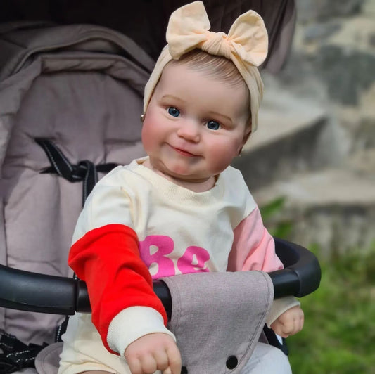 Poupée reborn Maddie corps souple de 60 cm yeux ouverts toute douce