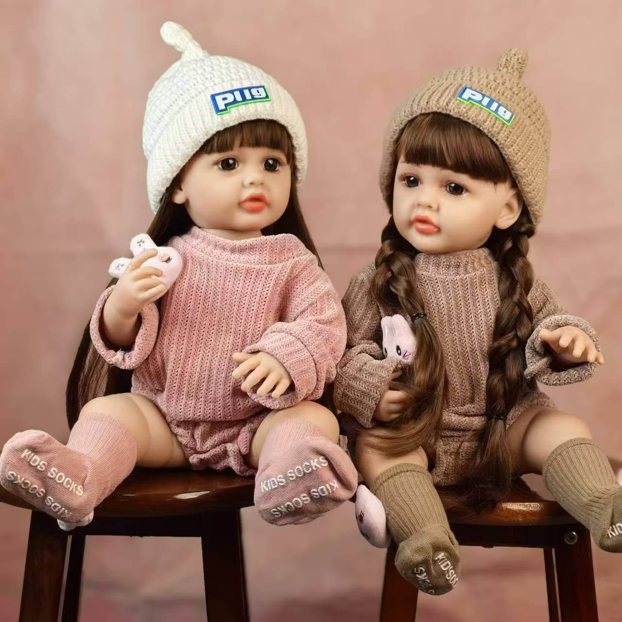 Bébés filles jumelles reborn aux cheveux longs et aux yeux bleus de 22 pouces - Betty