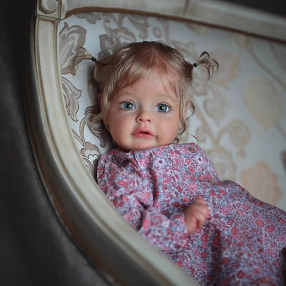 Poupée Reborn Suesue de 60 cm cheveux blonds yeux ouverts vêtements à fleurs violettes