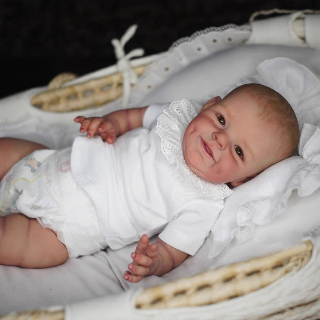 Bébé Reborn de 55cm yeux ouverts corps souple et souriant - Shaya