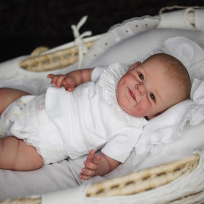 Bébé Reborn de 55cm yeux ouverts corps souple et souriant - Shaya