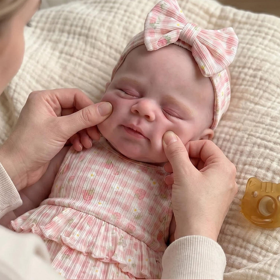45cm entièrement en silicone extensible endormi Pascale Reborn bébé fille dans des bodys floraux