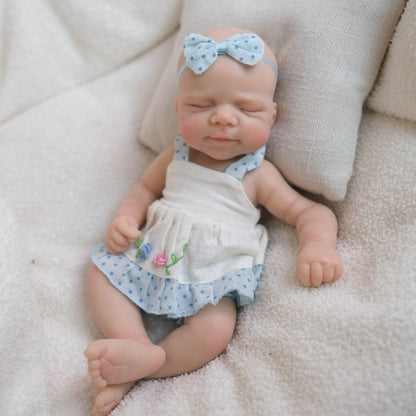 Bébé reborn Pascale en silicone de 20 cm fille vêtue d'une robe bleue