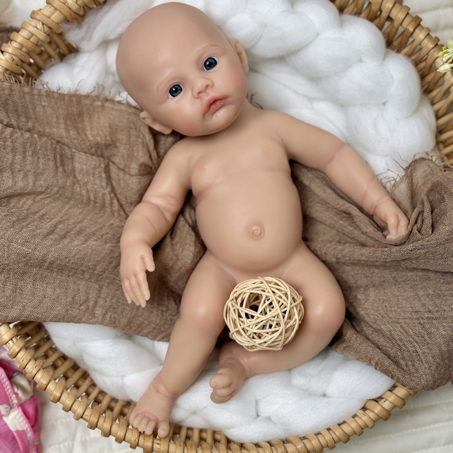 Bébé reborn en silicone de 30 cm fille vêtue d'une robe rose