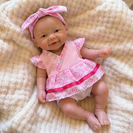 Vivienne Reborn Doll Fille en silicone de 20cm avec robe à fleurs rose