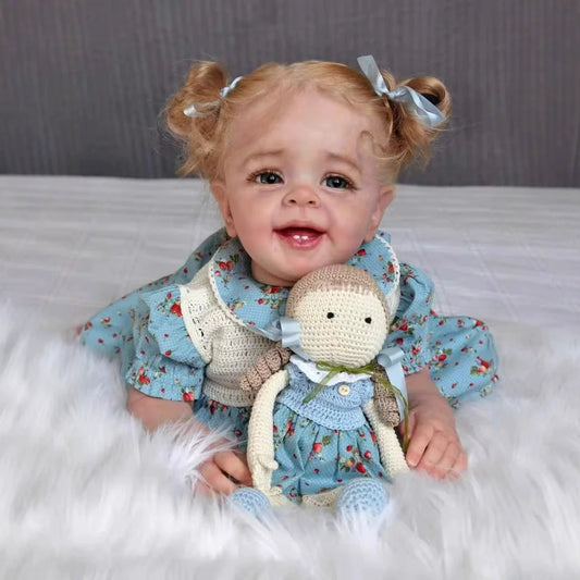 Bébé reborn Molly de 50 cm avec un sourire et des cheveux blonds réalistes