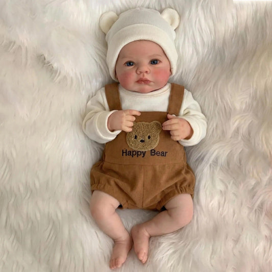 Poupée reborn Loulou de 48 cm aux yeux bleus vêtue d'une tenue d'ours brun