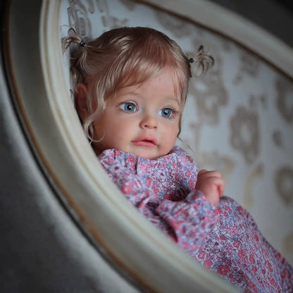 Poupée Reborn Suesue de 60 cm cheveux blonds yeux ouverts vêtements à fleurs violettes