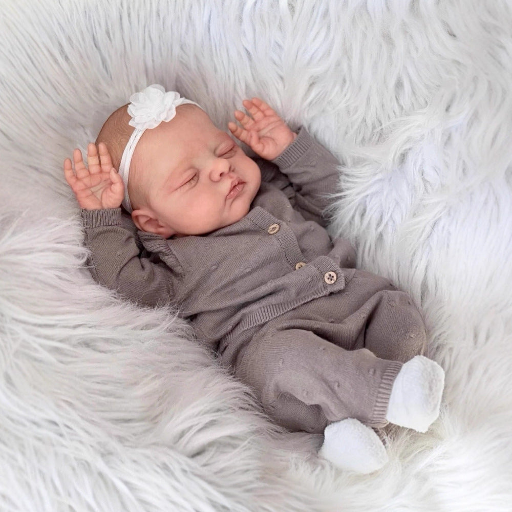 Poupée Reborn Irys corps souple et endormi 50cm