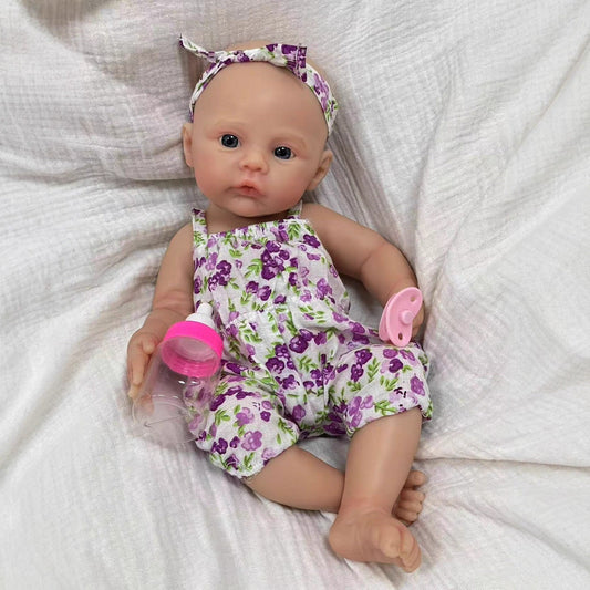 Bébé reborn de 30cm en silicone souple yeux bleus fille robe fleurie violette - Prairie