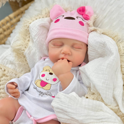 Poupée reborn Loulou de 45 cm entièrement en silicone extensible vêtue d'une tenue d'ours rose