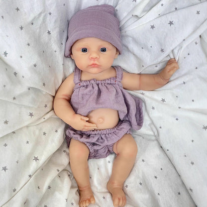 Bébé reborn fille de 30cm en silicone souple yeux bleus vêtue de vêtements violets - Prairie