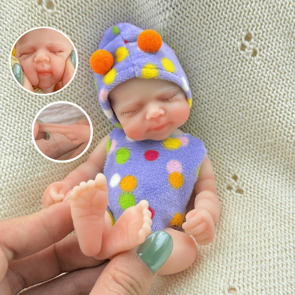 Poupée reborn miniature Pascale de 15 cm yeux fermés en silicone vêtue d'une tenue à pois violets