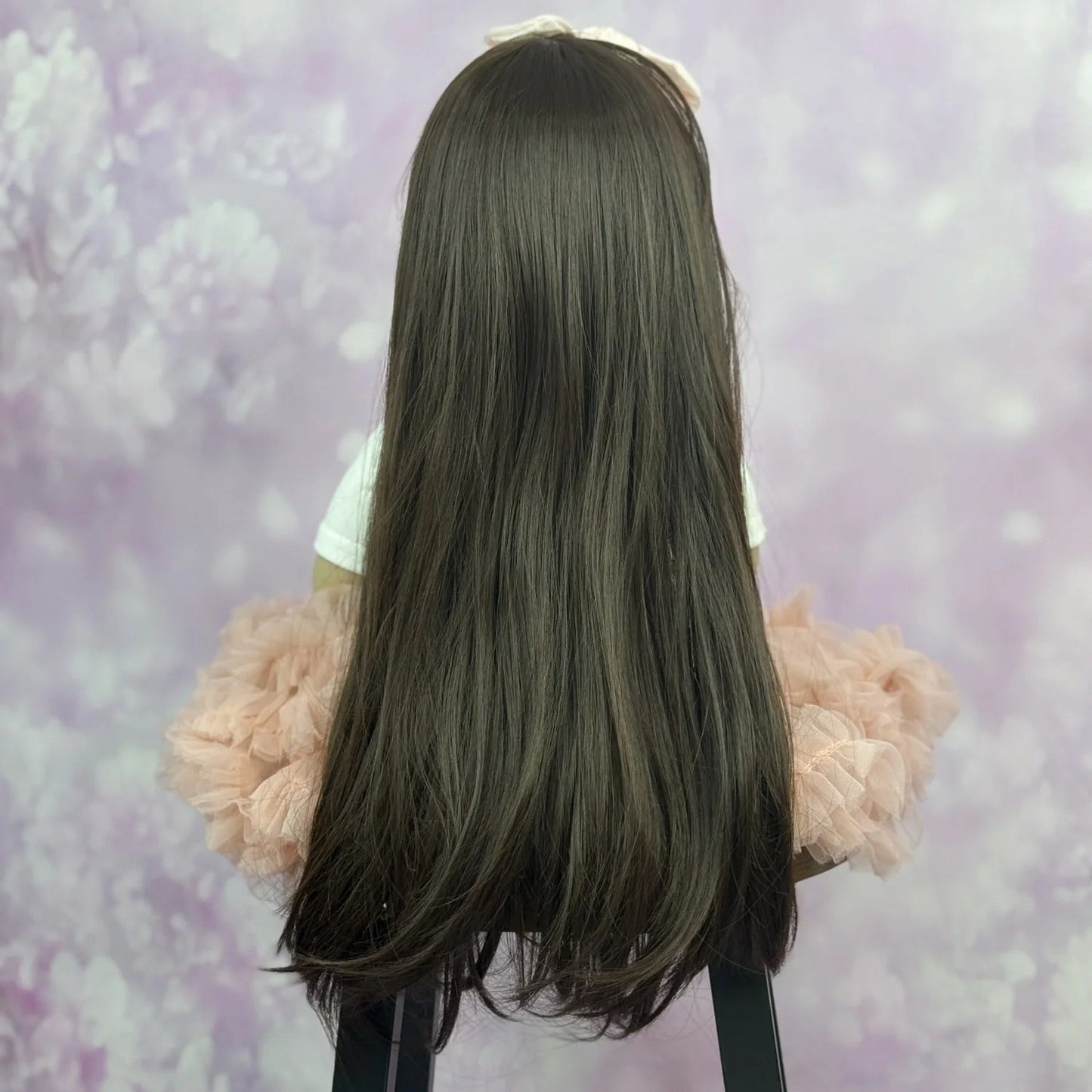 Bébé reborn Betty 55 cm cheveux longs robe rose