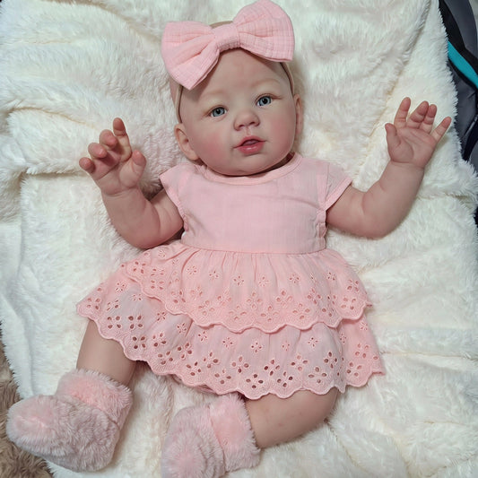 Bébé reborn Abigail de 48 cm (19 pouces) en robe rose