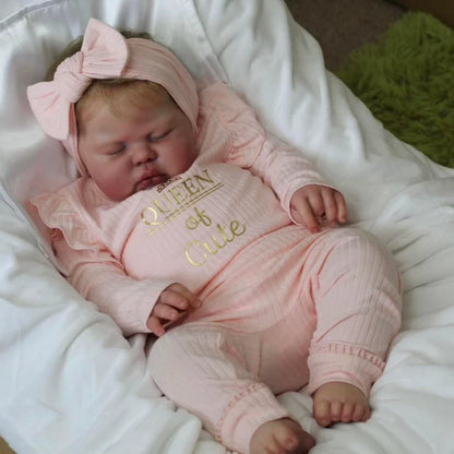 Poupée Reborn Pickle de 60 cm yeux fermés vêtements roses