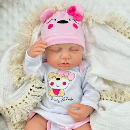 Poupée reborn Loulou de 45 cm entièrement en silicone extensible vêtue d'une tenue d'ours rose
