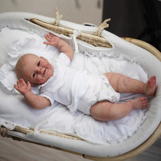 Bébé Reborn de 55cm yeux ouverts corps souple et souriant - Shaya