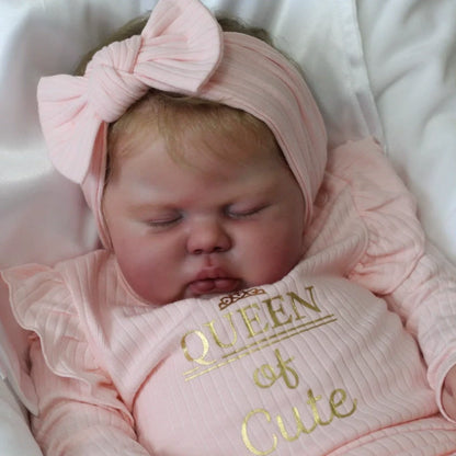 Poupée Reborn Pickle de 60 cm yeux fermés vêtements roses