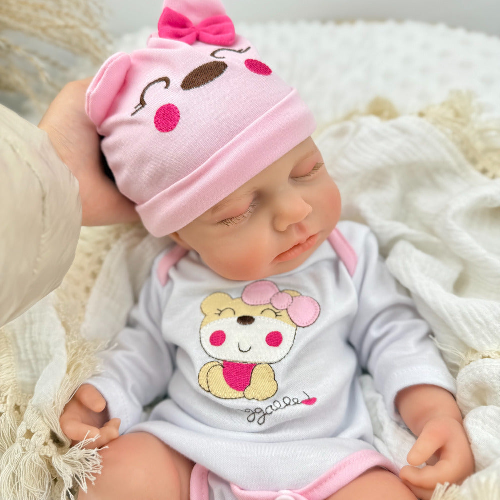 Poupée reborn Loulou de 45 cm entièrement en silicone extensible vêtue d'une tenue d'ours rose