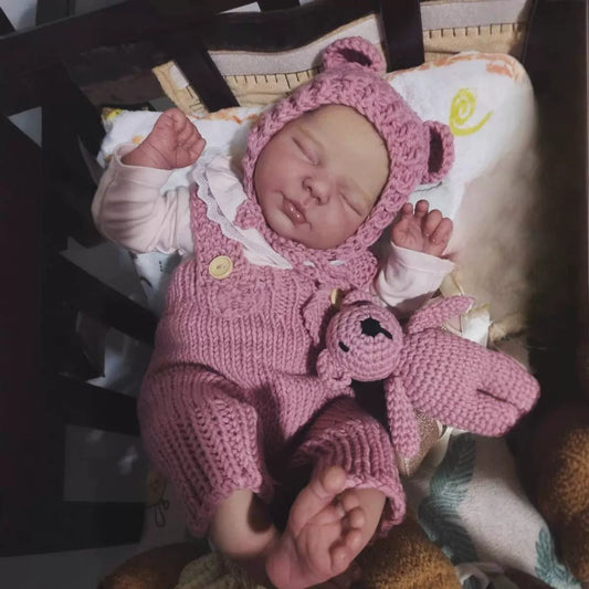 Poupée Reborn réaliste de 50 cm yeux fermés Valentina en body rose