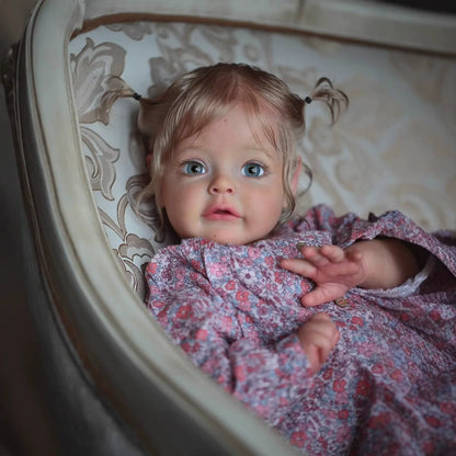 Poupée Reborn Suesue de 60 cm cheveux blonds yeux ouverts vêtements à fleurs violettes