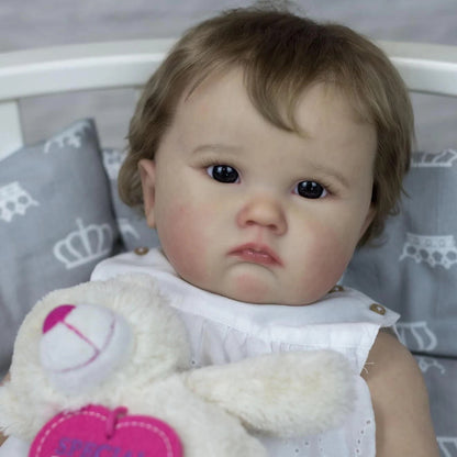 Poupée Reborn Cheryl 60 cm aux yeux bleus et cheveux bruns