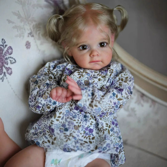 Poupée Reborn Maggie blonde aux yeux ouverts de 60 cm vêtements à fleurs