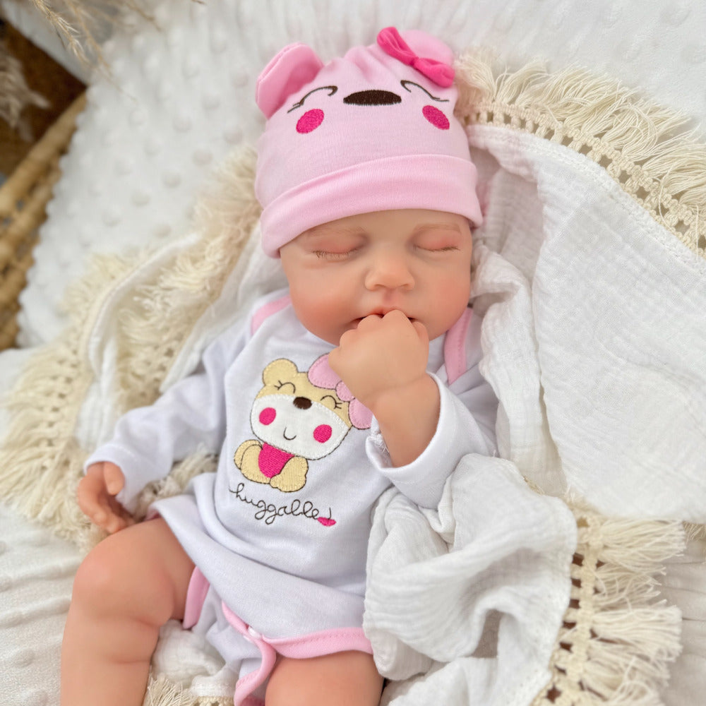 Poupée reborn Loulou de 45 cm entièrement en silicone extensible vêtue d'une tenue d'ours rose