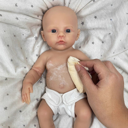 Bébé reborn fille de 30cm en silicone souple yeux bleus vêtue de vêtements violets - Prairie