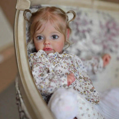 Poupée Reborn Suesue de 60 cm yeux bleus cheveux blonds vêtements à fleurs