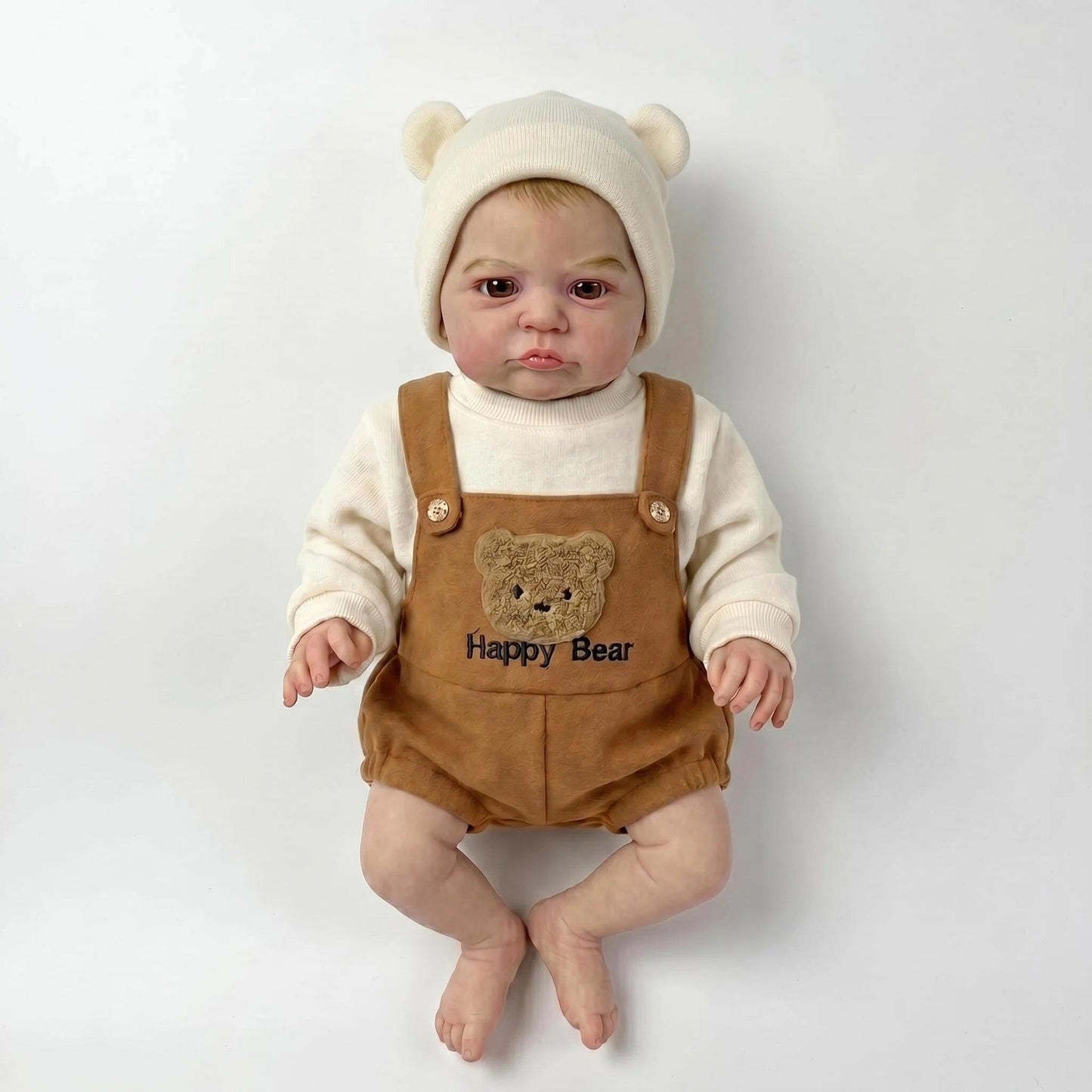 Poupée reborn héron de 48 cm aux yeux ouverts vêtue d'une tenue d'ours brun