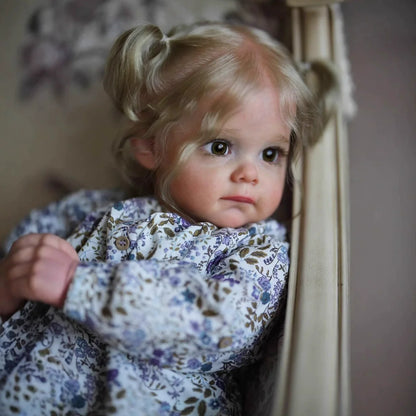 Poupée Reborn Maggie blonde aux yeux ouverts de 60 cm vêtements à fleurs