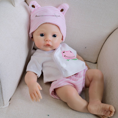 Bébé reborn de 30 cm en silicone souple yeux bleus fille vêtue de vêtements roses