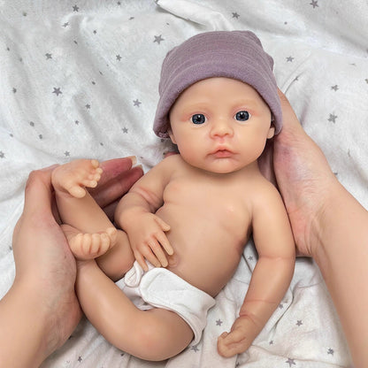 Bébé reborn fille de 30cm en silicone souple yeux bleus vêtue de vêtements violets - Prairie