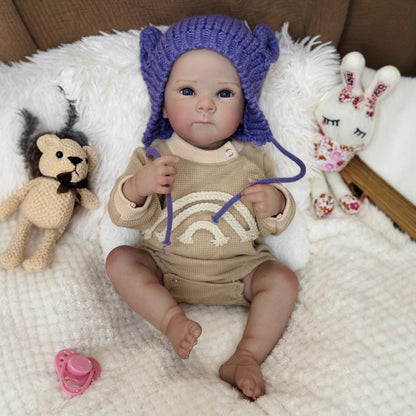 Bébé fille reborn Kelly aux yeux bleus de 50cm avec chapeau violet - Bettie